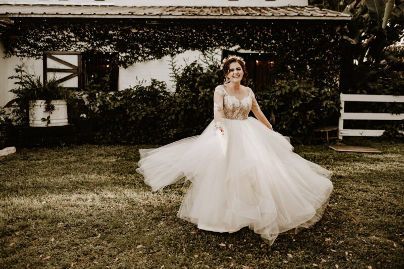 Bride twirls wedding dress