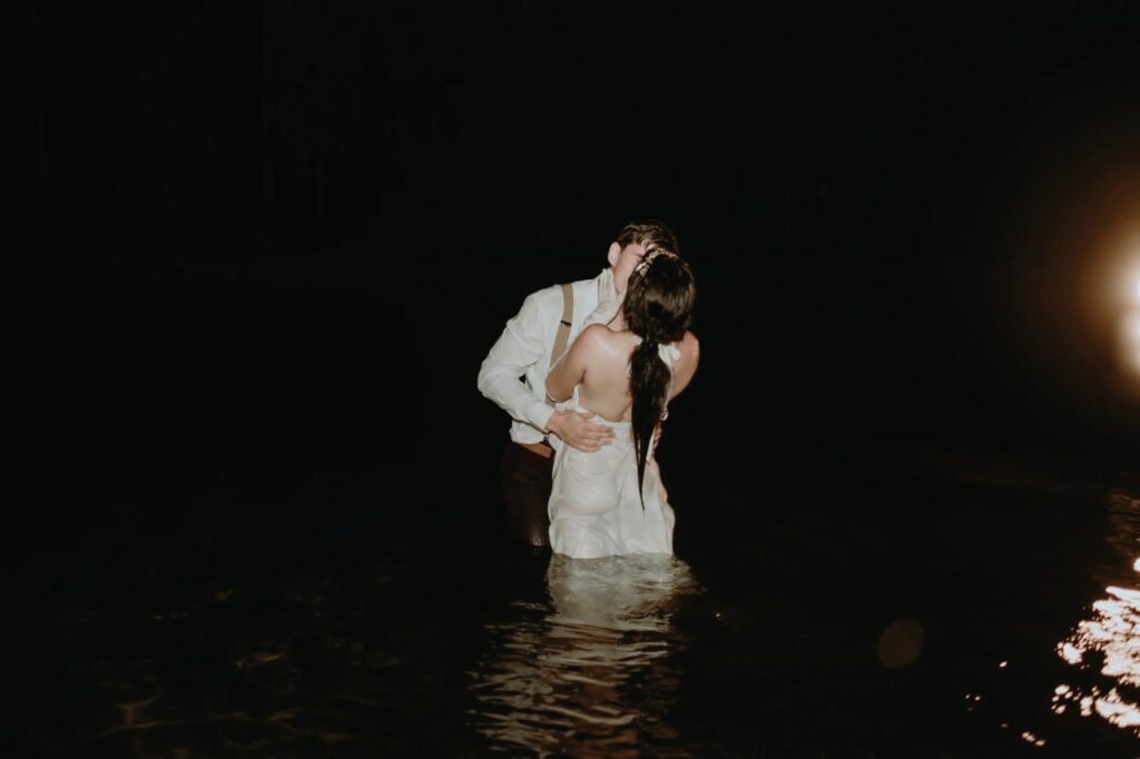 Closing scene magic: The fairytale ending to Meadow and Jonny's wedding – sparklers, lake jumps, and a bonfire