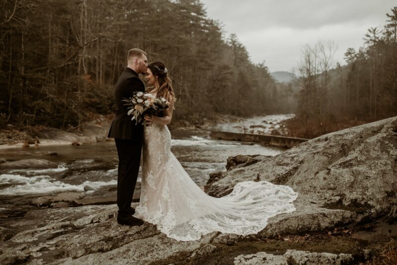 Best Places to Elope in North Carolina - Couple Posing at Brown Mountain Beach Resort