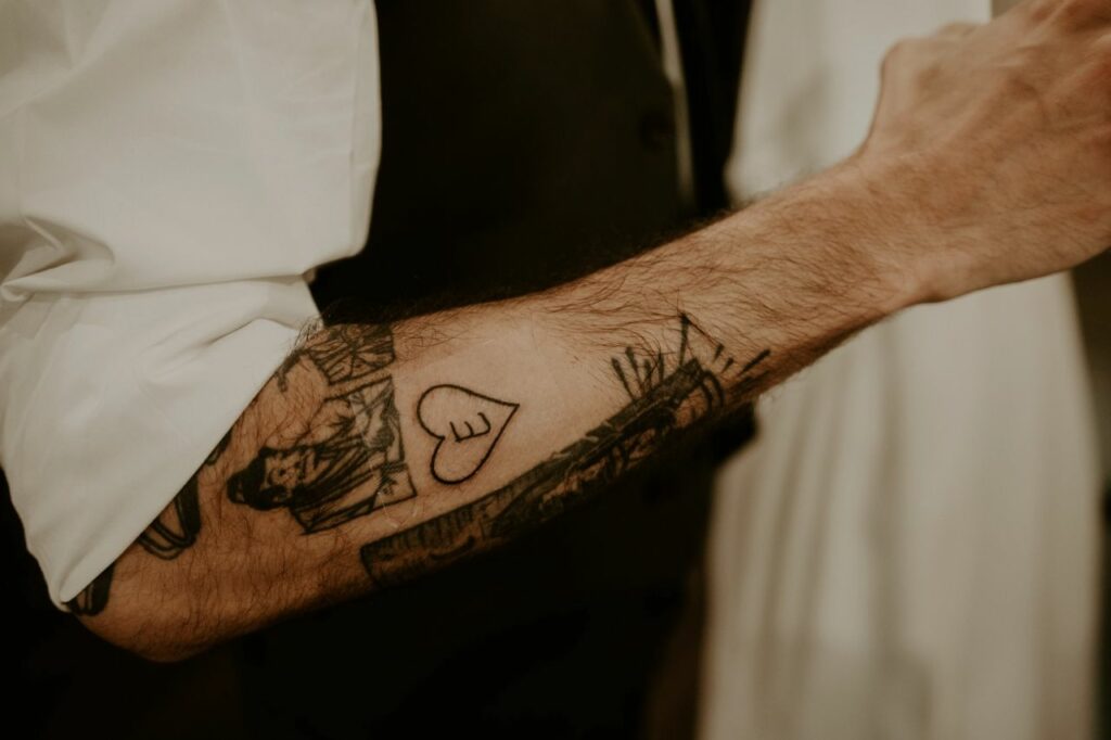 grooms tattoo he got at weding reception of his brides initial