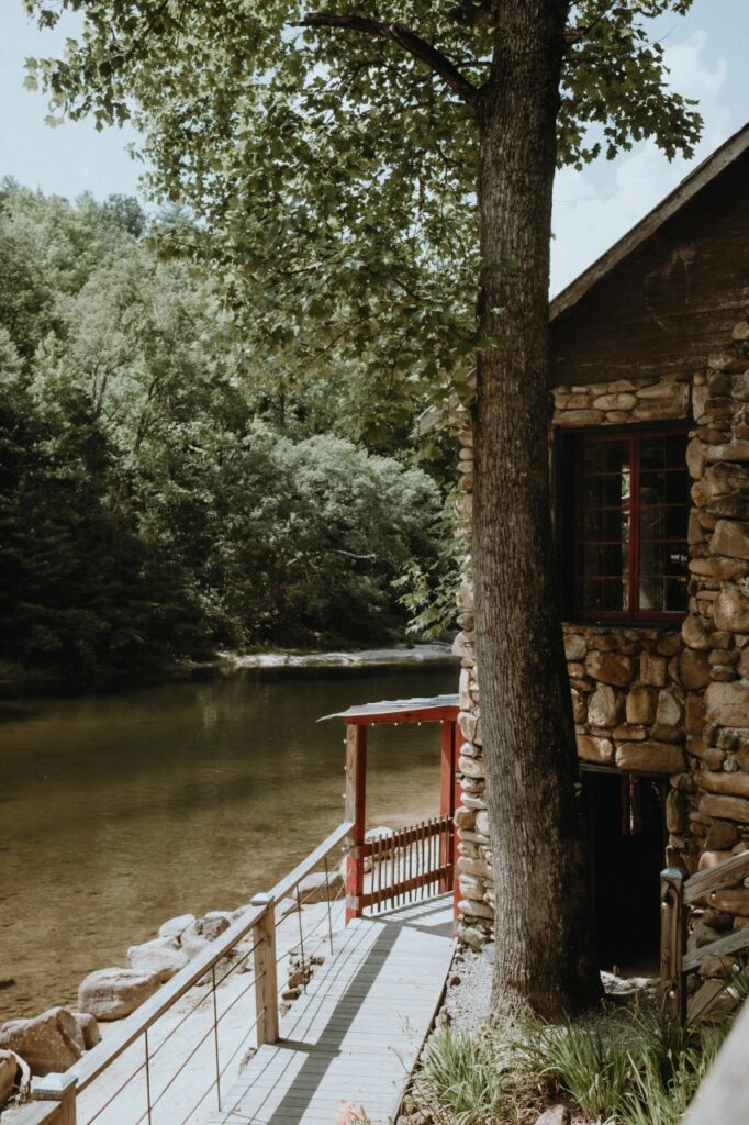 exterior of rock pavilion along the wilson creek river at Brown Mountain Beach Resort